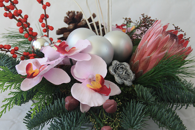 Terminologie Leeuw Ijveraar Kerststuk met orchidee bestellen en online laten bezorgen